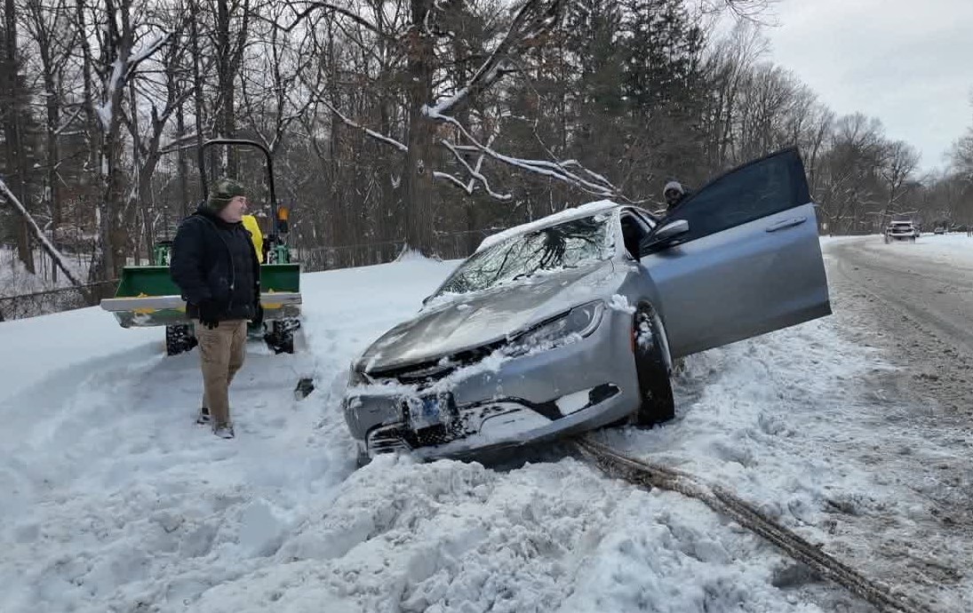 car in snow ditch.jpg