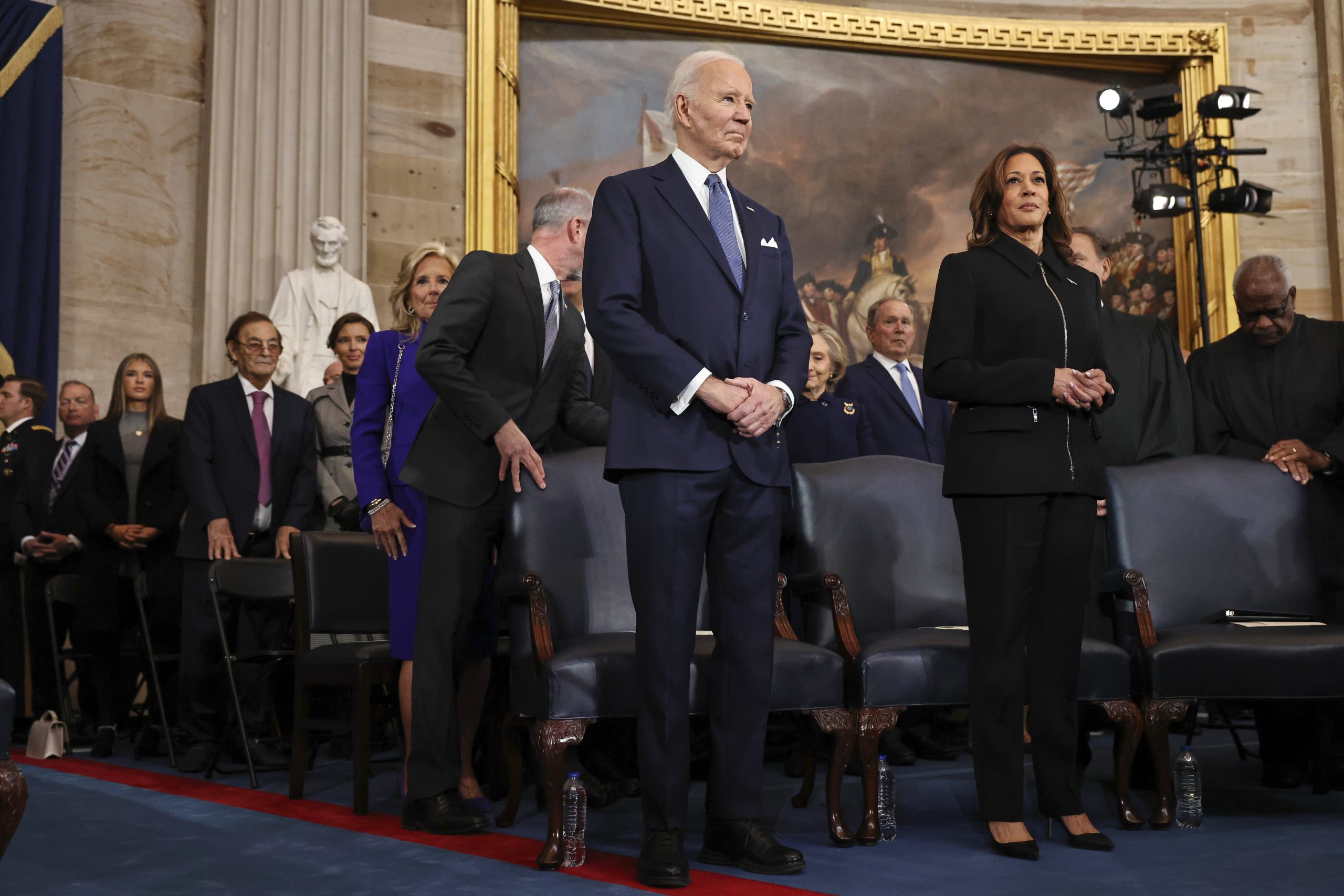 President Joe Biden and Vice President Kamala Harris arrive during the 60th Presidential Inauguration in the Rotunda of the U.S. Capitol in Washington, Monday, Jan. 20, 2025.