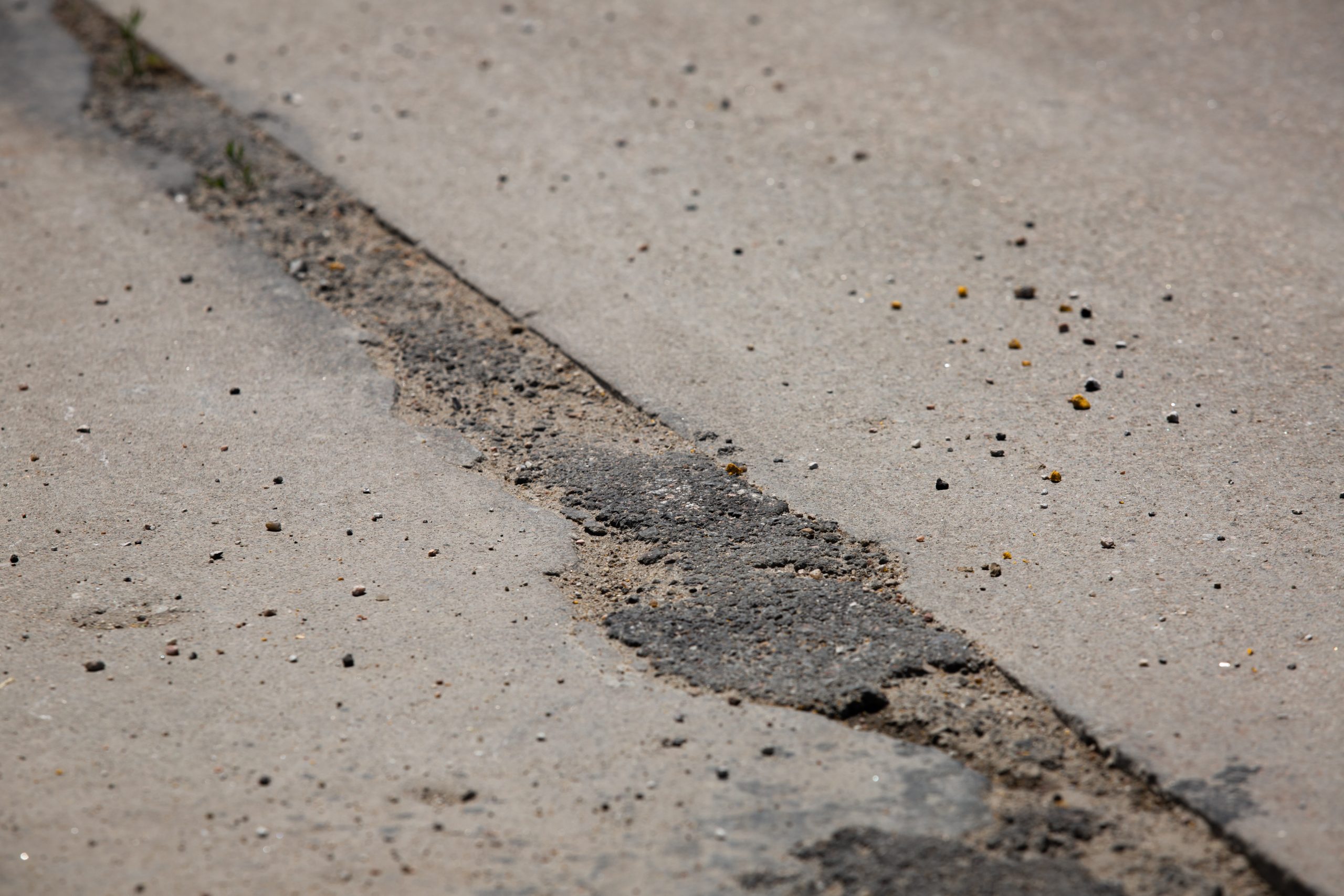 cracked road surface tight shot