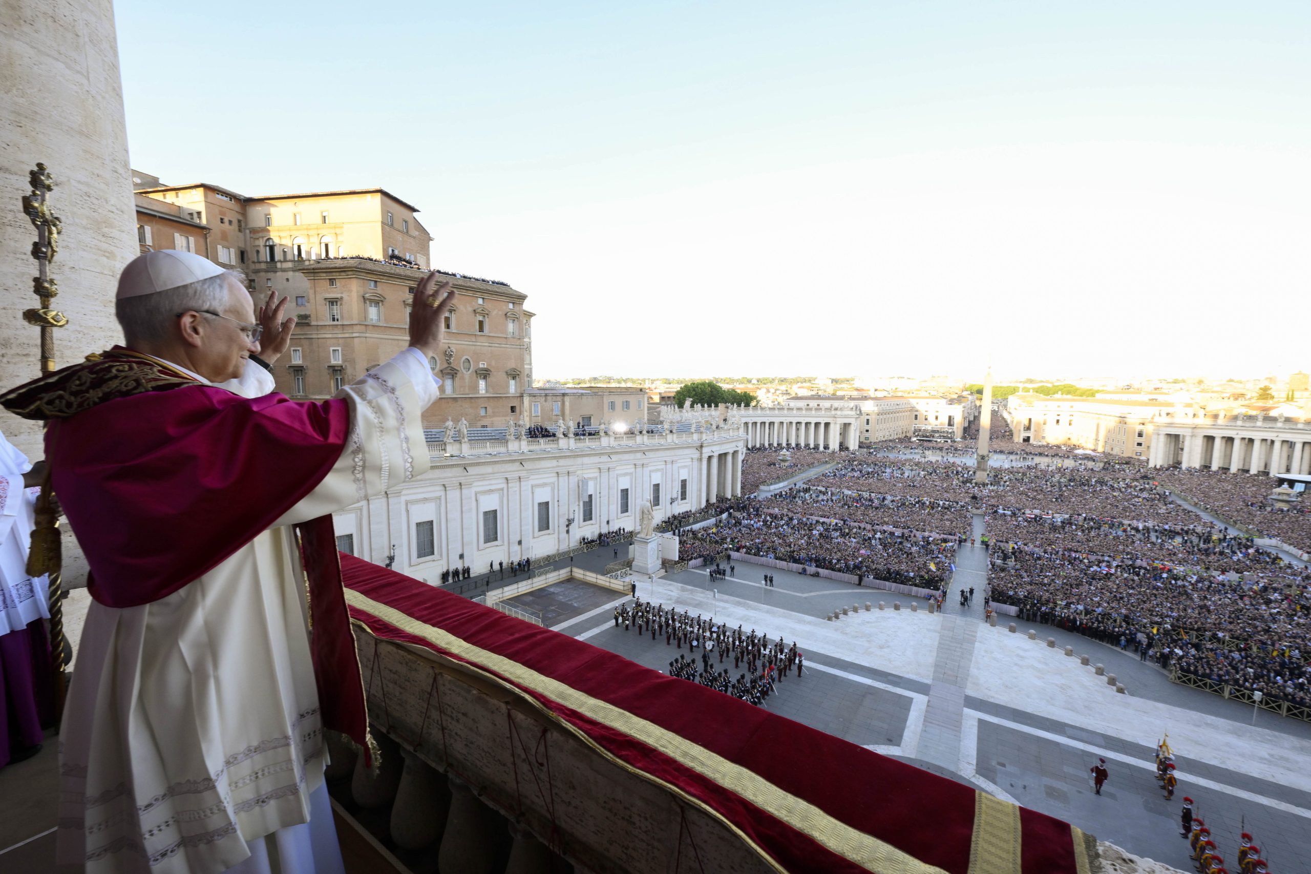 Newly elected Pope Leo XIV waves to faithful and pilgrims gathered in St. Peter's Square shortly after his election, Thursday, May 8, 2025. 