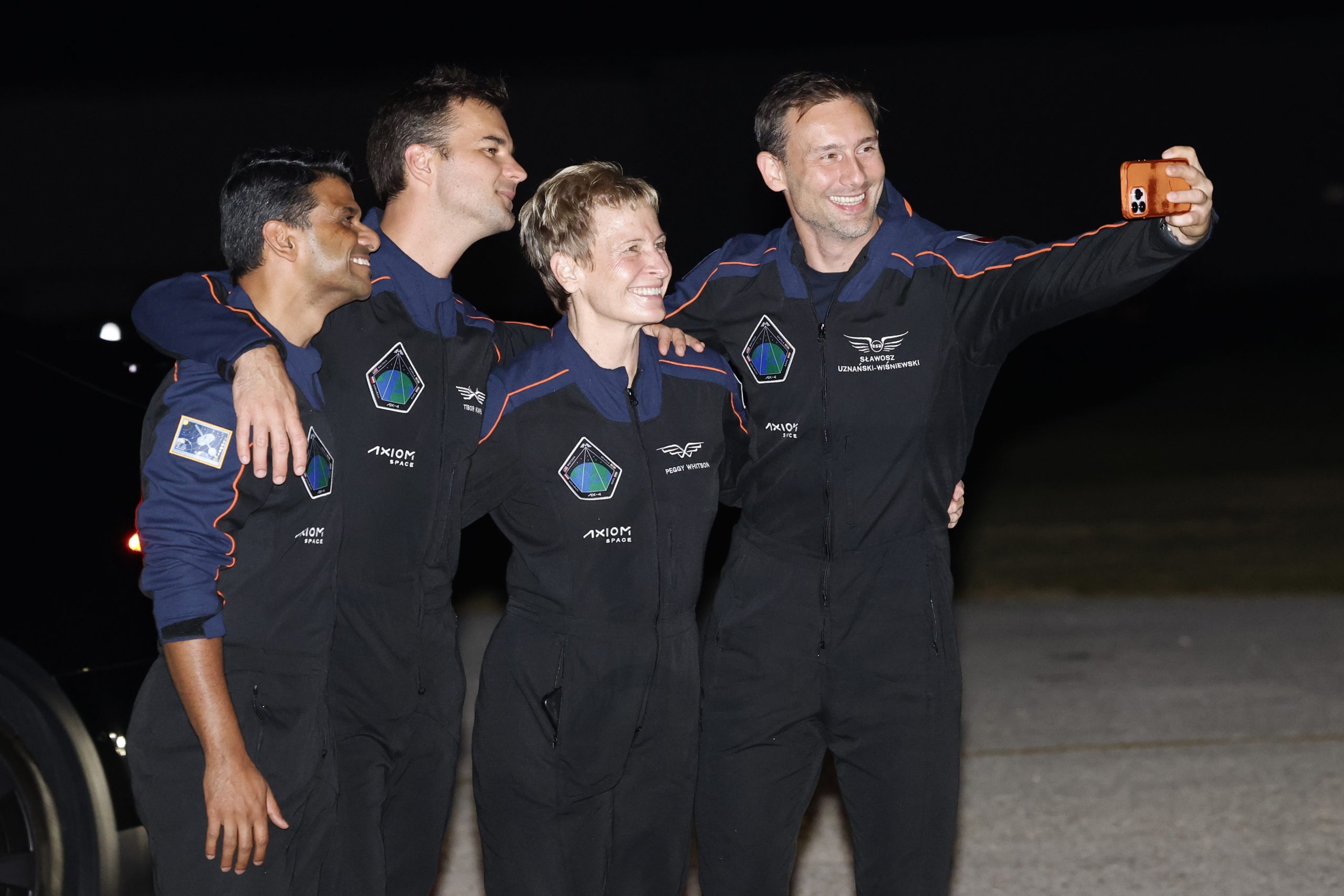 SpaceX Falcon 9 crew, Shubhanshu Shukla of the Indian Space Research Organization, from left, Tibor Kapu of Hungary, commander Peggy Whitson, and Slawosz Uznanski-Wisniewski of Poland, pose for a selfie.