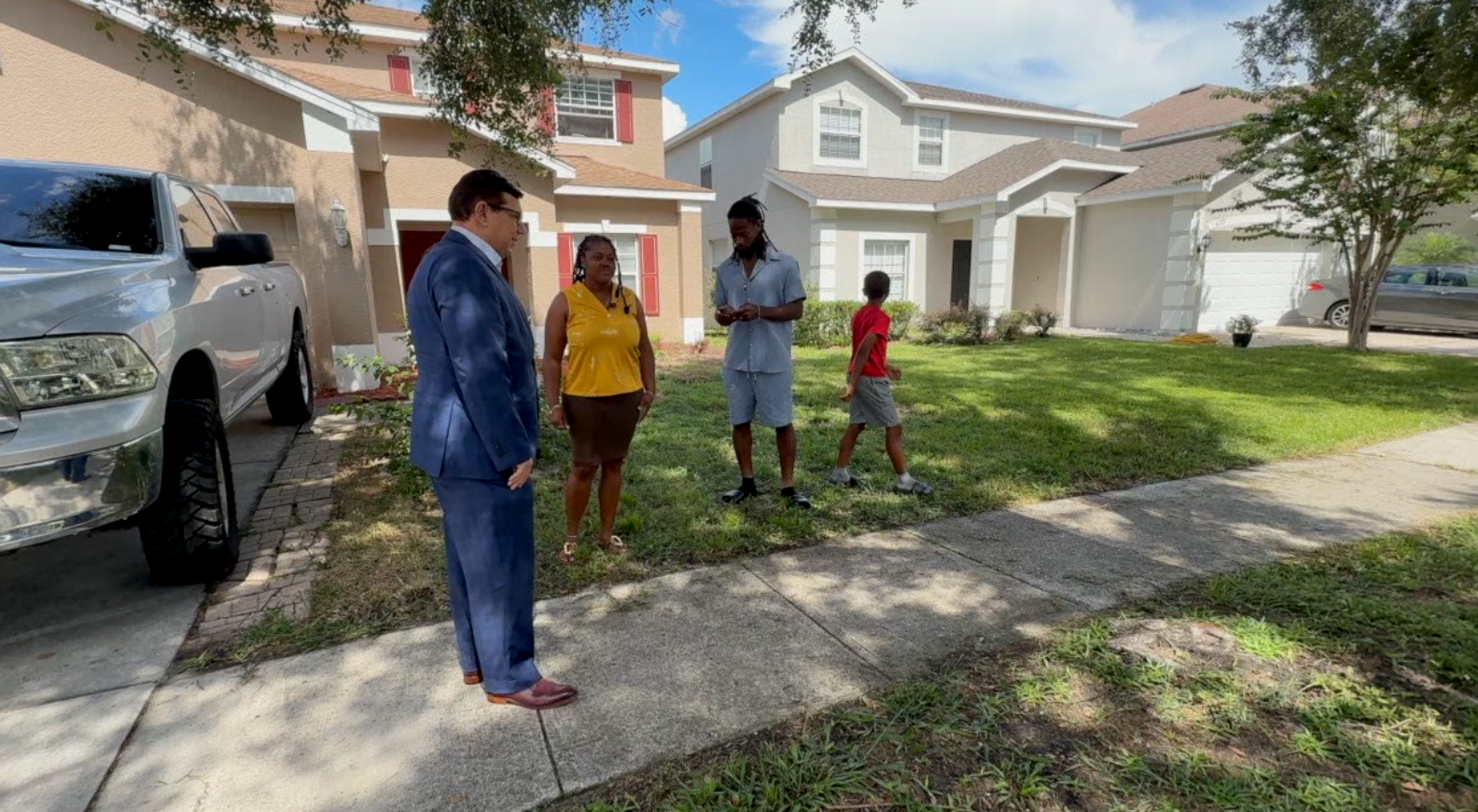 Irena Green was cited by her HOA for having dead grass in her front yard and was later sued in civil court. She says her lawn problems resulted from a large tree and watering restrictions.