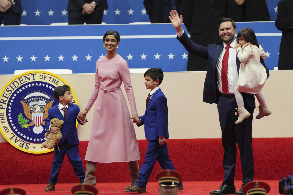Vice President JD Vance, second right, his wife Usha Vance, second left, and their children Vivek, from left, Ewan and Mirabel arrive at an indoor Presidential Inauguration parade event in Washington, Monday, Jan. 20, 2025.