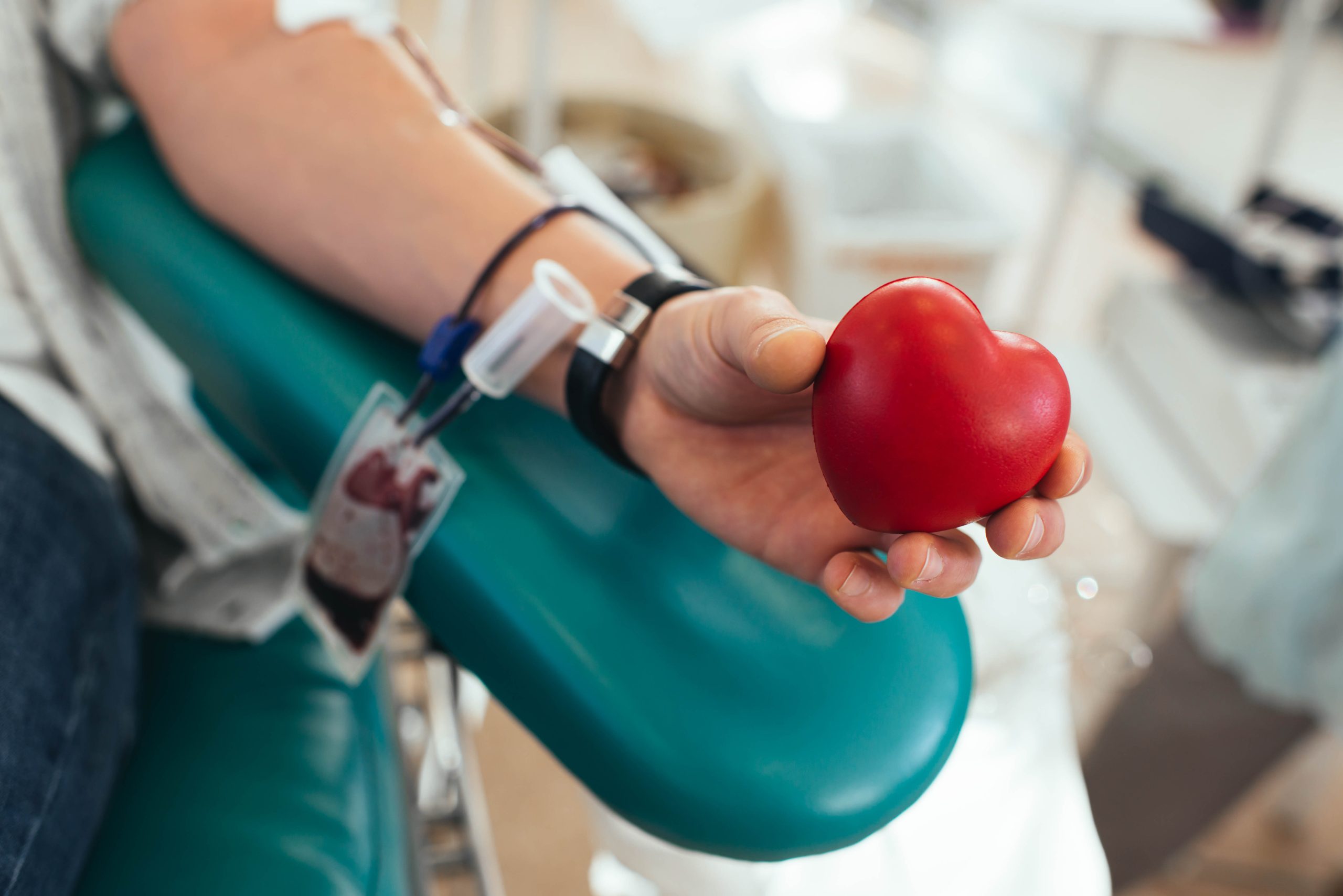 Blood,Donor,Squeezes,The,Rubber,Bulb,In,The,Form,Of