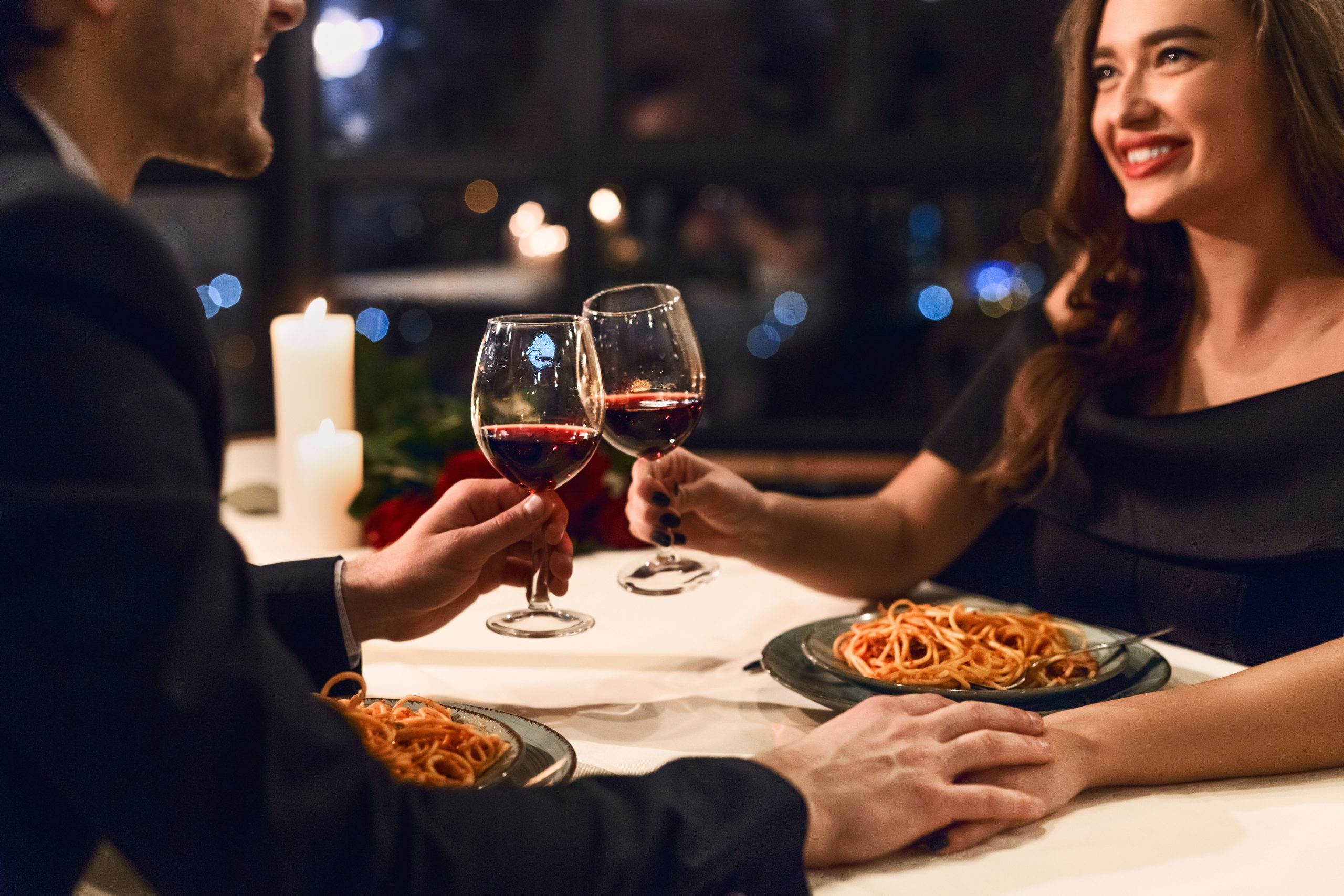 Happy,Couple,Having,Romantic,Dinner,In,Restaurant,,Eating,Pasta,And